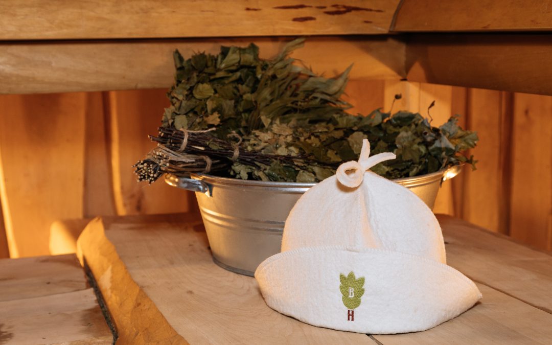 Why should you wear a hat in the banya?